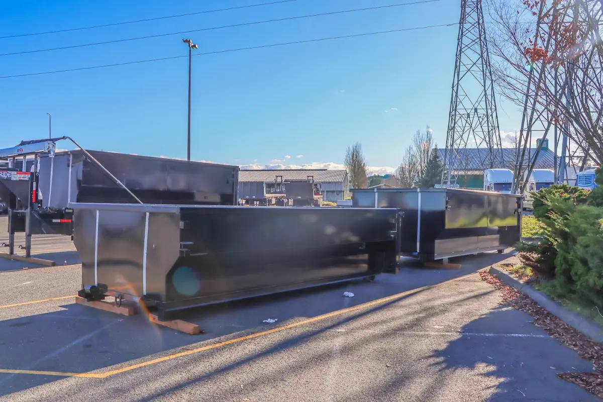 Roll-off dumpster ready for waste disposal at job site for 2 Yard Dumpster Rental in Lynwood